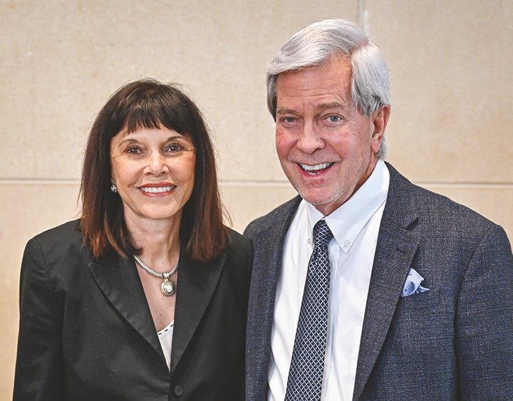 Bill Carter, thrilled that he finally has a picture with his beautiful wife—the camera-shy, ever-elusive Fran